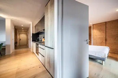 a small apartment with a bedroom and a bed at Maira Les Carroz - by EMERALD STAY in Arâches-la-Frasse