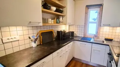 a kitchen with a sink and a counter top at Les Chalets de Flaine Hameau - maeva Home - Chalet 4 pièces 6 personnes - Prestige MAE-3971 in Flaine