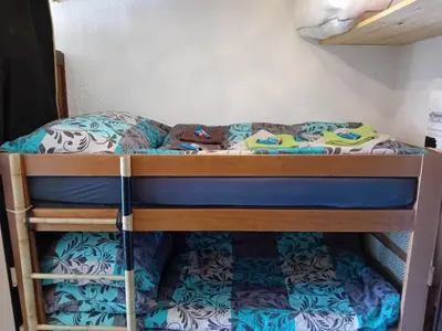 a bunk bed in a dorm room with a bunk bed at Ski1600 - GrandMassif in Samoëns