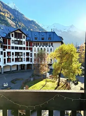 a view of a large building in a city at Studio avec balcon vue MontBlanc et parking gratuit le nid daigle in Chamonix-Mont-Blanc
