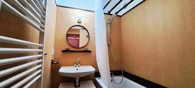 a bathroom with a sink and a mirror at Résidence Sirius - maeva Home - Studio 4 personnes - Confort MAE-3731 in Arâches-la-Frasse