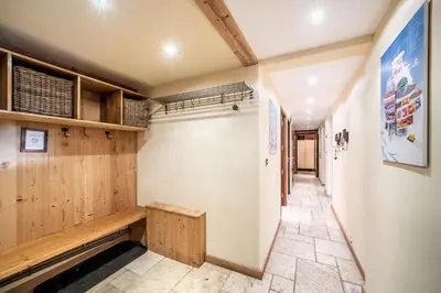 a room with wooden walls and a hallway at Chalet Ibex Les Houches Chamonix - by EMERALD STAY in Les Houches