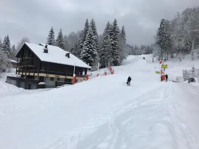 a ski lodge on a snow covered ski slope at Studio 4 pers, skis aux pieds, lave-vaisselle, lave-linge, balcon - FR-1-572-299 in Arâches-la-Frasse