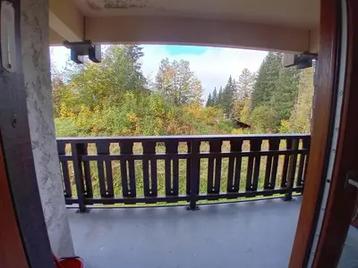 a view from a window of a balcony at Studio 4 pers, skis aux pieds, lave-vaisselle, lave-linge, balcon - FR-1-572-299 in Arâches-la-Frasse