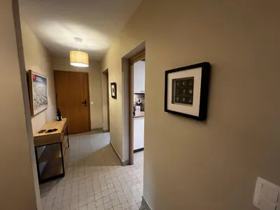 a hallway with a room with a sink and a counter at Vue du Mont-Blanc in Passy