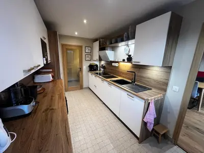 a kitchen with a sink and a counter top at Vue du Mont-Blanc in Passy