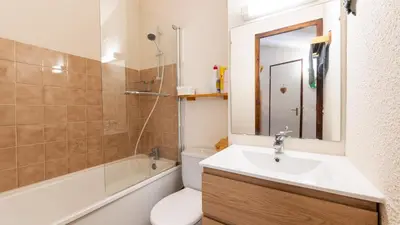 a bathroom with a sink and a toilet and a bath tub at Grand Horizon 2 301 - 3P8 in Morillon