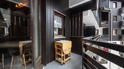 a room with a table and a window and a staircase at Grand Horizon 2 301 - 3P8 in Morillon
