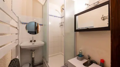 a small bathroom with a sink and a shower at Grand Horizon 2 301 - 3P8 in Morillon