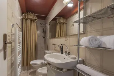 a bathroom with a sink and a toilet at Le Bedux - Privée - Calme - Terrasse - Vues in Chamonix-Mont-Blanc