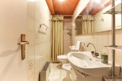 a bathroom with a sink and a toilet at Le Bedux - Privée - Calme - Terrasse - Vues in Chamonix-Mont-Blanc