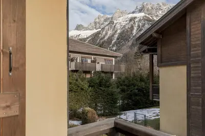a balcony with a view of a mountain at Capucins 3 in Chamonix-Mont-Blanc