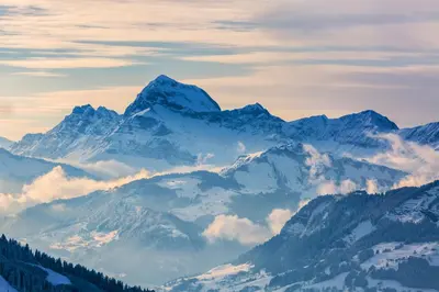 a view of a mountain range with snow at Stella Megeve Palais garage in Megève