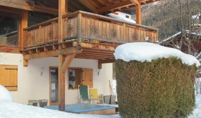 a balcony of a house with snow on it at Chalet Minouche in Chamonix-Mont-Blanc