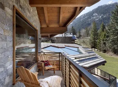 a deck with a swimming pool on top of a house at Chalet Alta in Chamonix-Mont-Blanc