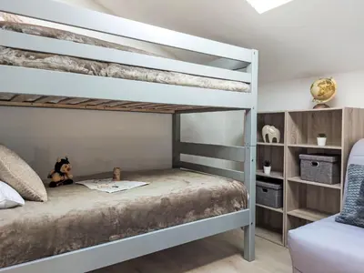 a bunk bed in a bedroom with a bunk bedutenewayeway at Apartment La coupe de Cristal by Interhome in Saint-Gervais-les-Bains