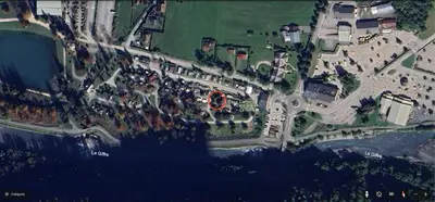 an aerial view of a city with houses and the ocean at Le Refuge, Mobil Home 3 rooms avec Climatisation in Samoëns