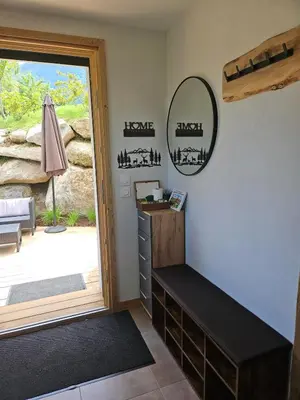a room with a desk and a mirror next to a door at Apartment in Saint-Gervais close to gondola in Saint-Gervais-les-Bains