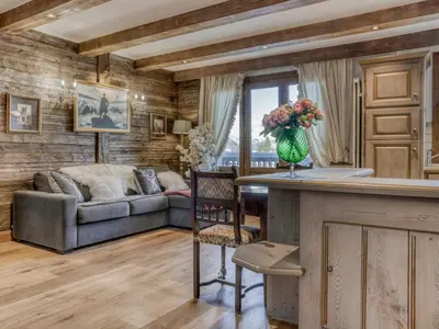 a living room with a couch and a table at Appartement Pratique Centre Megève - 4 Pers - Animaux Bienvenus - FR-1-453-324 in Megève