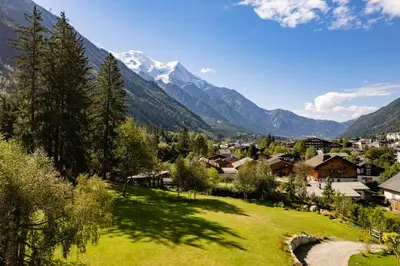 a village in a valley with mountains in the background at Chalet Angel - Chamonix in Chamonix-Mont-Blanc