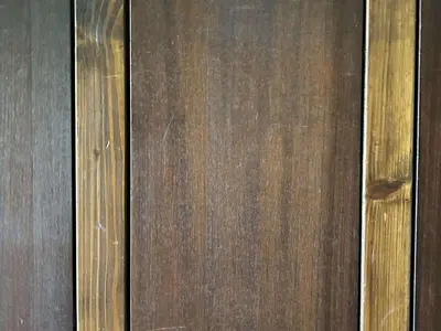 a close up of a wooden door with wood panels at Studio à Megève avec parking souterrain et casier à skis - FR-1-597-189 in Megève