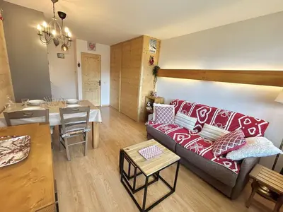 a living room with a couch and a table at Studio à Megève avec parking souterrain et casier à skis - FR-1-597-189 in Megève
