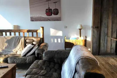 a living room with two couches and a couch at Apartment in residence near the Mont d'Arbois in Megève