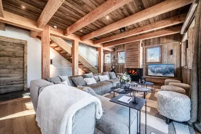 a living room with a couch and a fireplace at Chalet Betula, Saint-Gervais - by EMERALD STAY in Saint-Gervais-les-Bains
