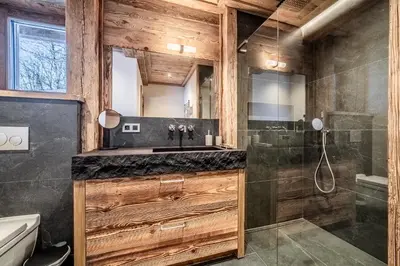 a bathroom with a sink and a shower at Chalet Betula, Saint-Gervais - by EMERALD STAY in Saint-Gervais-les-Bains