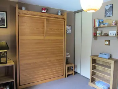 a closet with a wooden door in a room at Résidence Combettes - Combettes E288 MAE-5071 in Les Contamines-Montjoie