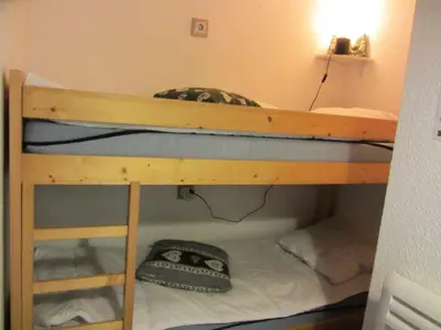 a bunk bed in a small room with a bunk bedutenewayangering at Résidence Combettes - Combettes E288 MAE-5071 in Les Contamines-Montjoie