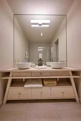 a bathroom with two sinks and a large mirror at Le Miroir De Saint-Jacques in Sallanches
