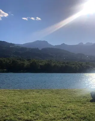 a view of a lake with mountains in the background at Chez Sab in Passy