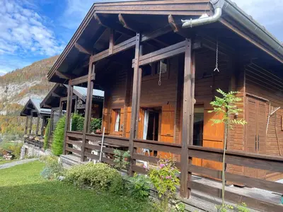 a log cabin in the mountains with a view at Chalet paisible avec cheminée et animaux acceptés près des pistes - FR-1-624-176 in Sixt