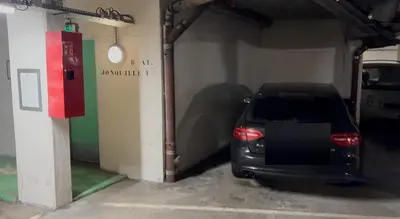a car parked inside of a parking garage at Au Coin du Mont Blanc in Chamonix-Mont-Blanc