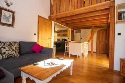a living room with a couch and a coffee table at Petit Brio - Fabulous apartment in Samoens sleeps up to 4 in Samoëns