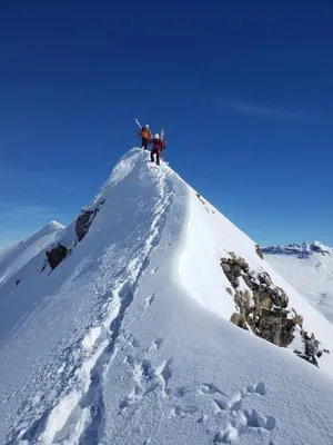 two people standing on top of a snow covered mountain at Petit Brio - Fabulous apartment in Samoens sleeps up to 4 in Samoëns