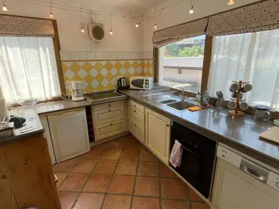 a kitchen with a sink and a counter at Appartement au cœur de Samoëns – 3 chambres, 2 sdb, parking inclus - FR-1-629-143 in Samoëns