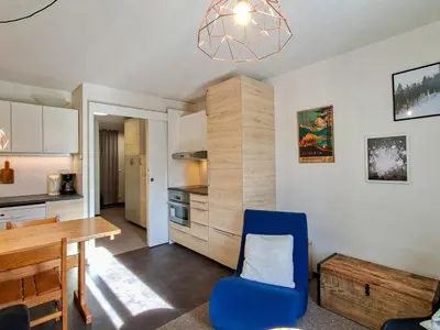 a living room with a couch and a table at Appartement spacieux 6 pers, balcon, Flaine centre - FR-1-425-229 in Arâches-la-Frasse