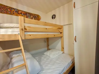 a bunk bed and a ladder in a room at Appartement spacieux 6 pers, balcon, Flaine centre - FR-1-425-229 in Arâches-la-Frasse