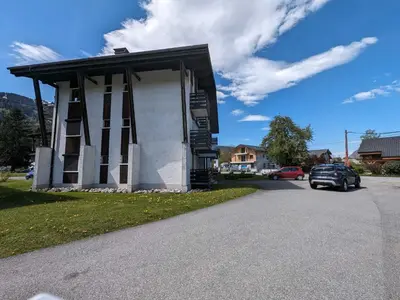 a small building on the side of a road at Appartement T3 avec 3 balcons et parking, proche centre - FR-1-624-26 in Samoëns