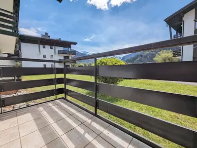 a balcony with a view of the mountains at Appartement T3 avec 3 balcons et parking, proche centre - FR-1-624-26 in Samoëns