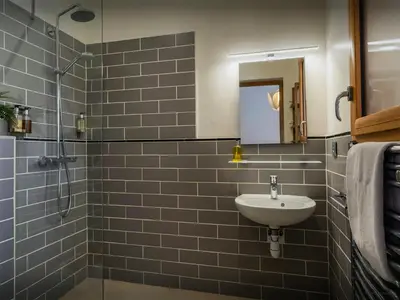 a bathroom with a sink and a shower at Chalet Nordchamp - OVO Network in Samoëns