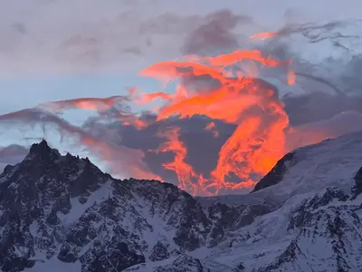 an eruption of a volcano on top of a mountain at Apartment Aiguille Rose in Les Houches