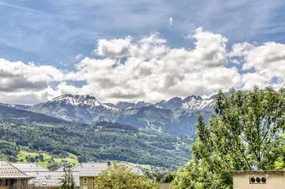 a view of a mountain range with snow covered mountains at Appartement Cosy - 1 à 2 chambres proche thermes et ski in Saint-Gervais-les-Bains