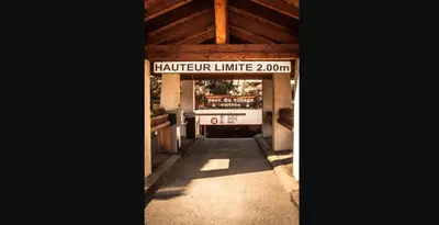 a building with a sign that reads cafeteria limit ounce at SANTA MARIA MEGEVE proche village in Megève