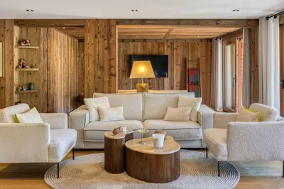 a living room with a couch and chairs and a table at Alto in Combloux