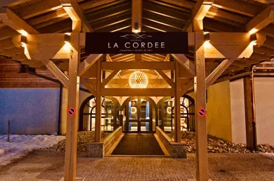 a building with a sign that reads la concorde at CHAMONIX Résidence La Cordée avec Piscine et Spa - Appartement 126 in Chamonix-Mont-Blanc