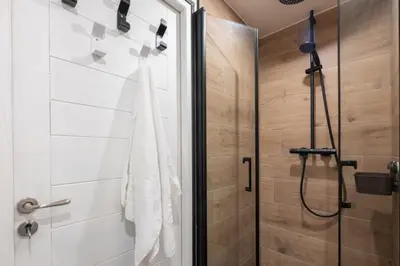 a shower in a bathroom with a shower stall at Duplex T3 with terrace in Chamonix in Chamonix-Mont-Blanc
