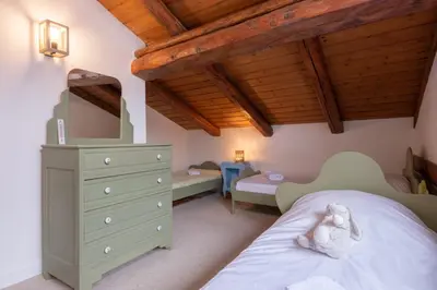 a living room with a couch and a table at Duplex T3 with terrace in Chamonix in Chamonix-Mont-Blanc